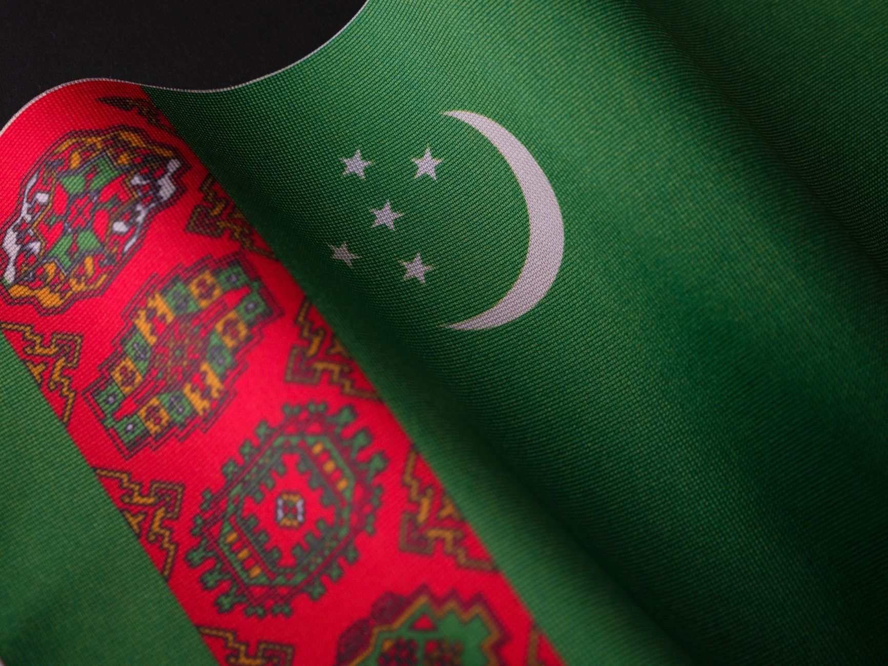 Turkmen Translation Services in India support visual with Enuncia Global branding